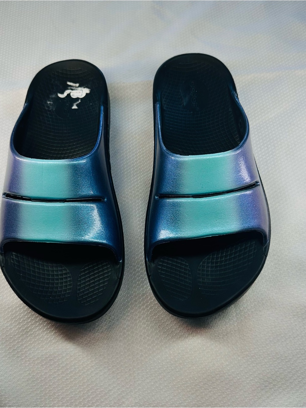 OOFOS Iridescent Blue-Green Foam Slide Sandals